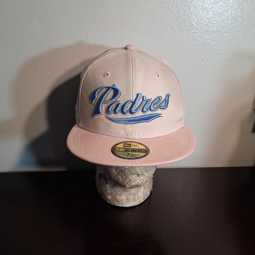 San Diego Padres pink cap with blue 'Padres' script logo flat brim 7 1/2